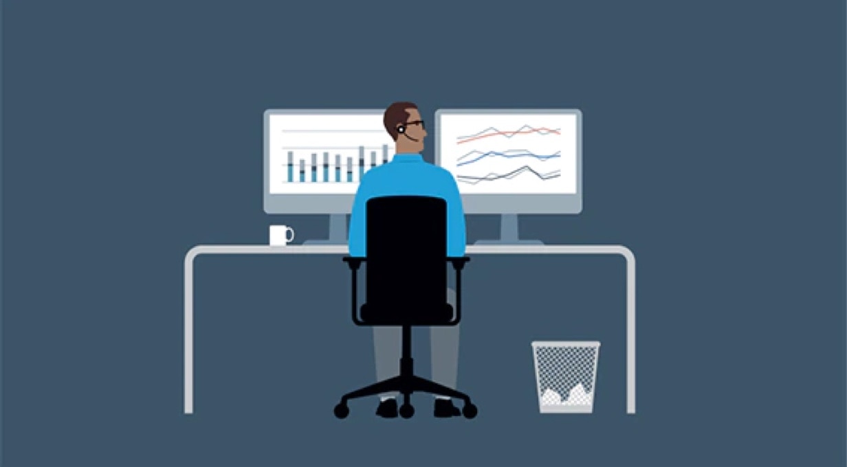 : A drawing of a businessperson sitting at a desk with a computer and two screens. 