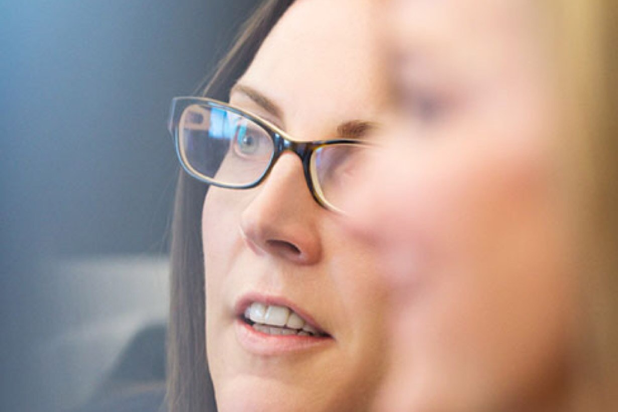 Two women discuss the qualities they look for in an investment advisor.
