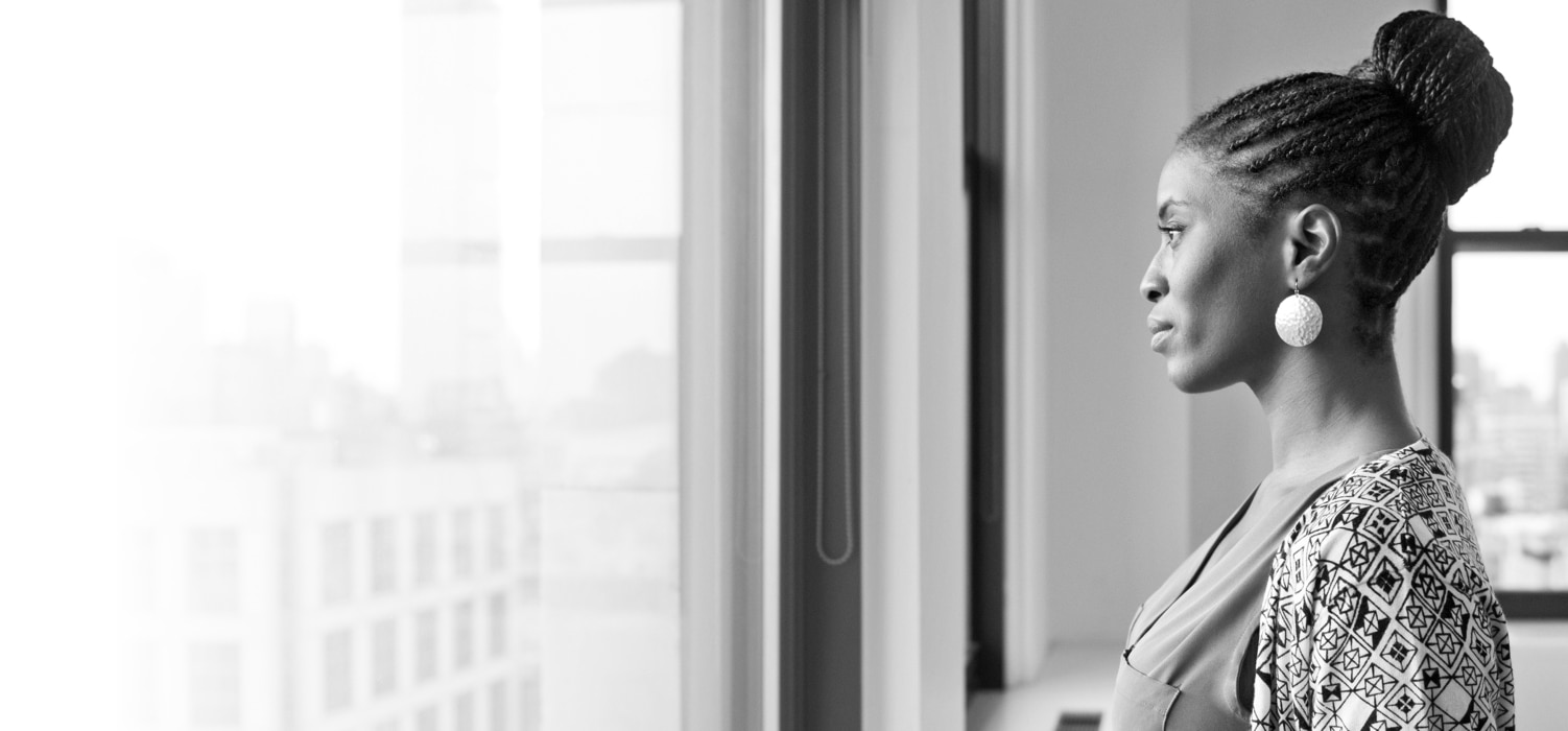 A woman looking out of a window