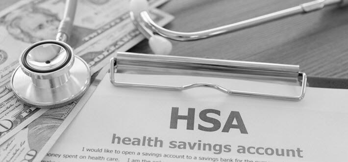Health savings account paperwork on a table