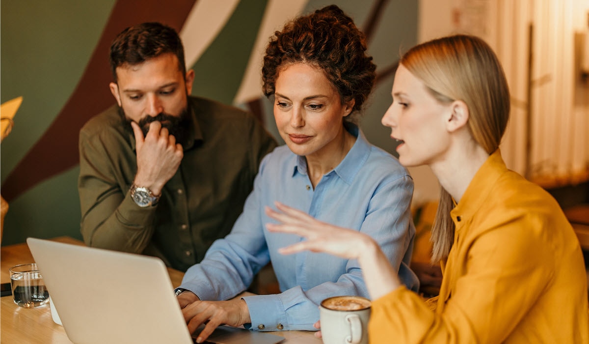 Group of business people discussing ideas and collaborating on a project