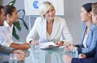 The position of power and leadership is the center, whether you’re in a meeting or taking a photo.